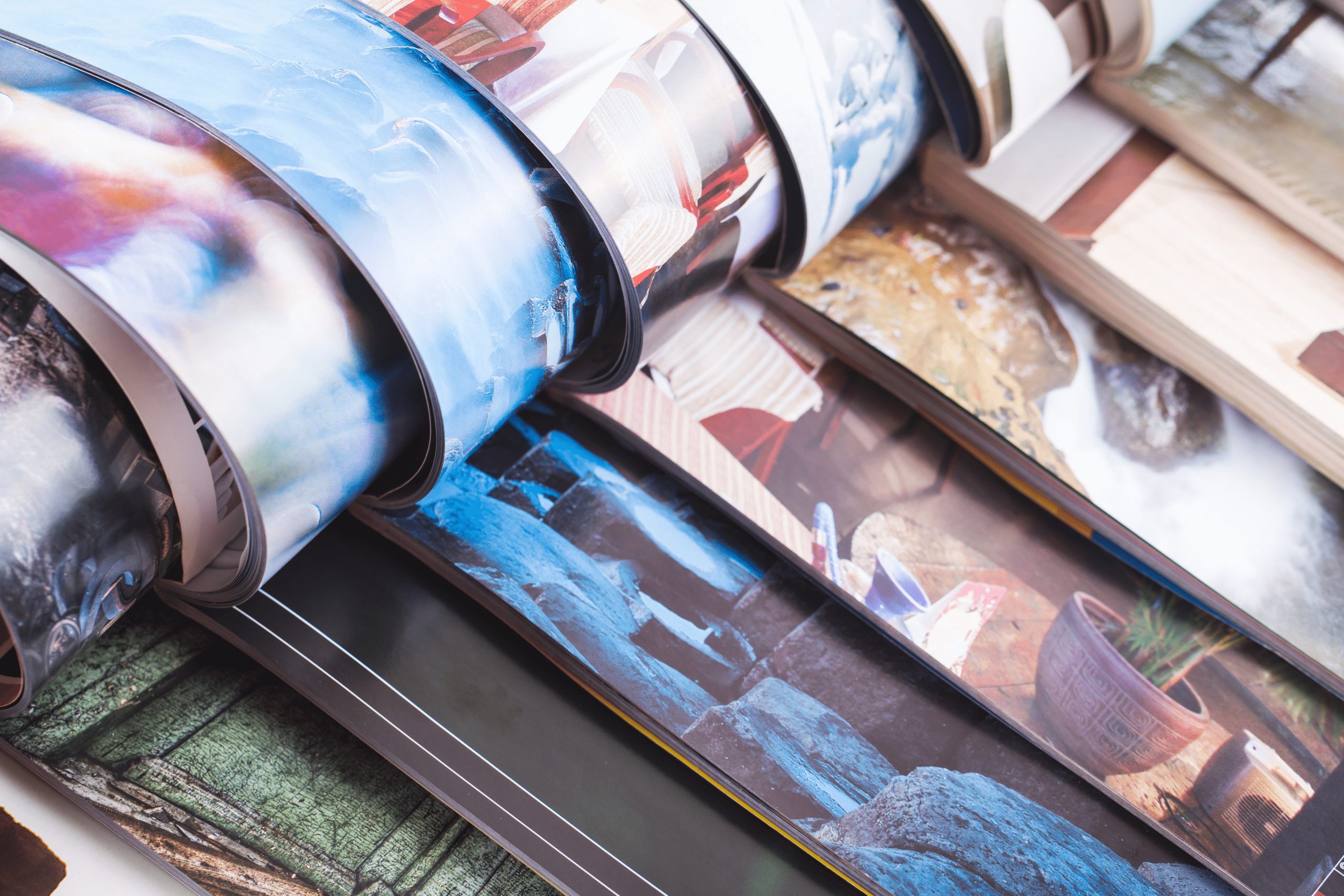 Rolled-up prints display vibrant landscapes and textures